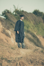 graduate standing outdoors