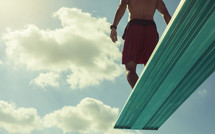 man on a diving board 