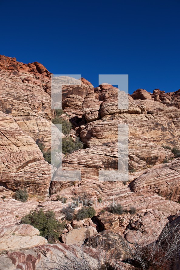 side of a red rock mountain in Nevada