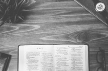 Amos, open Bible, Bible, pages, reading glasses, wood table 