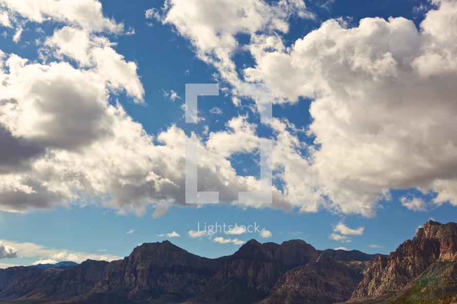 clouds in the blue sky over mountains in Nevada