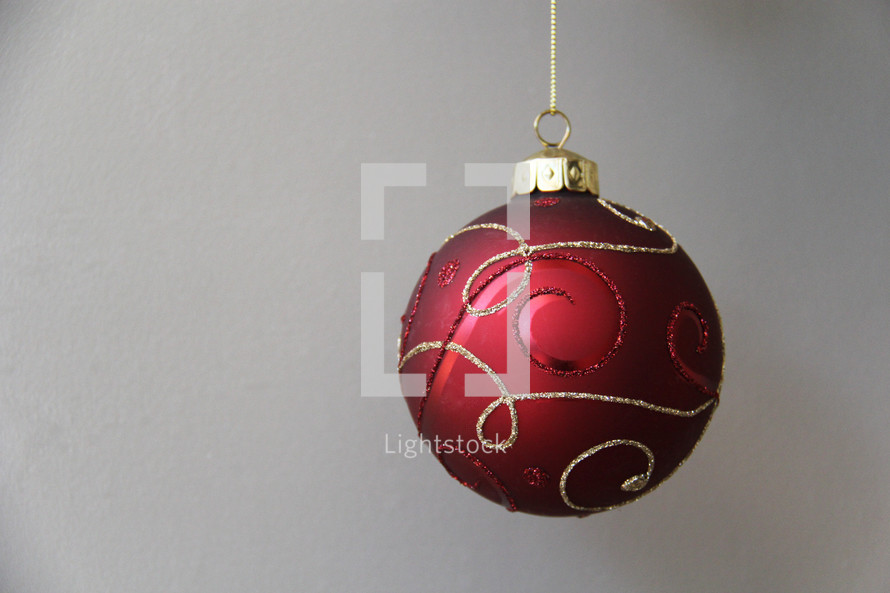 red and gold hanging Christmas ornament 