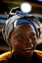 woman with a scarf on her head in Africa 