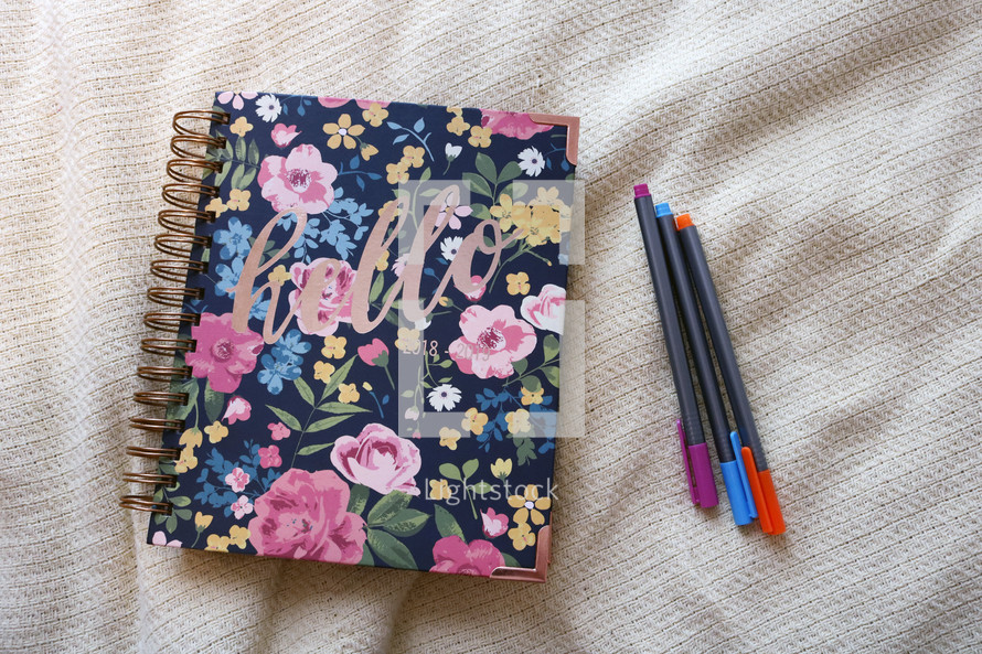 notebook and pens 