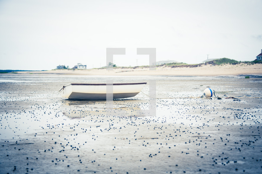 beached boat on a shore 