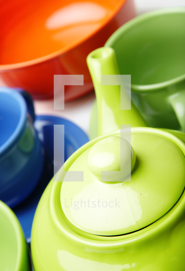 colorful tea pot and tea cups 