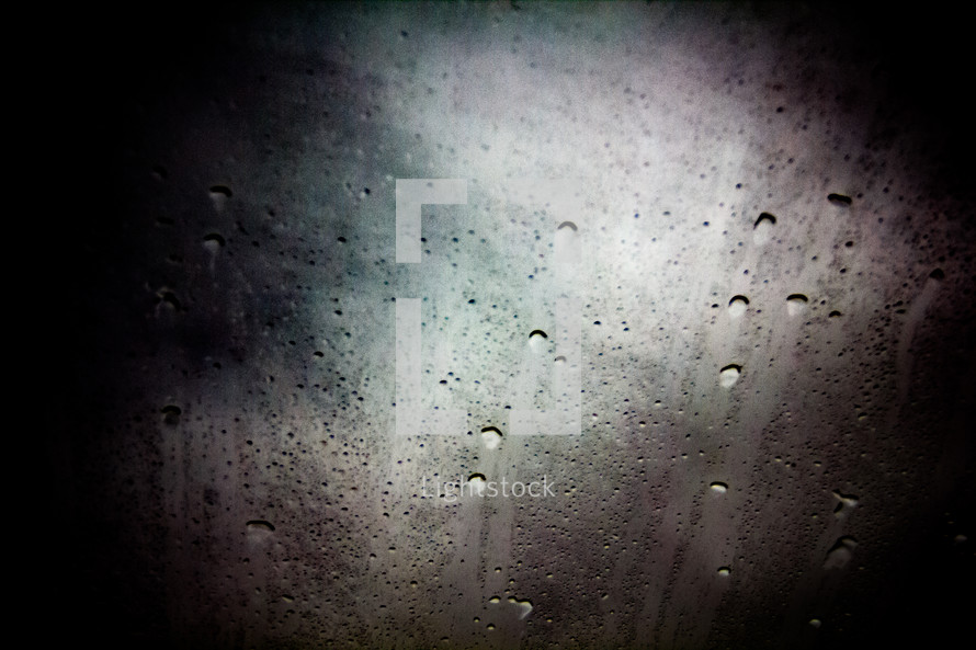 rain on a fogged up window 
