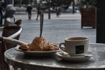 coffee and pastry on a table 