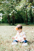 infant portrait sitting in grass