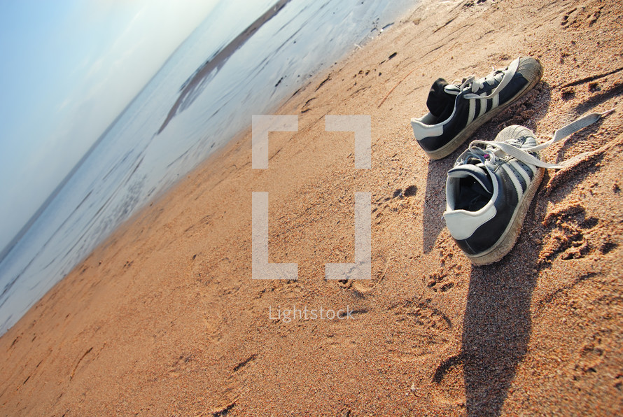 sneakers on a beach 