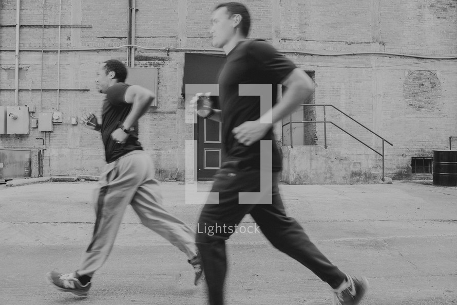 two men jogging 