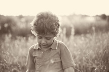 toddler in a field 