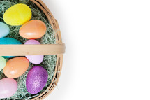 Easter eggs in a basket from an above angle. 
