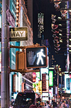 pedestrian crossing in NYC at night 