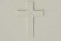 White cross on a white background 