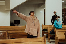 Boy worshiping in church