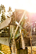 horse equipment on a fence post