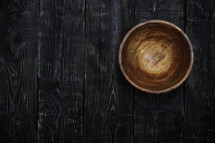 wooden bowl on wood boards 