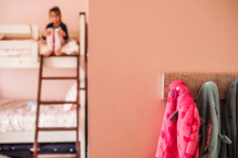 child on a bunk bed 