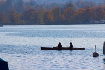 men in a canoe 
