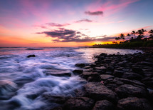 rocky Hawaiian beach at sunset 