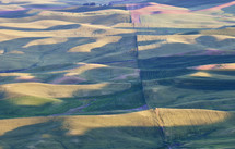 aerial view over rolling hills 