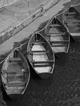 Canoe boats on water