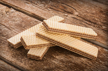 wafers with chocolate on rustic wooden table