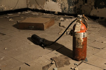 fire extinguisher in an abandoned room 