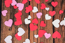paper hearts on wood 