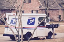 A mailman delivering the mail 