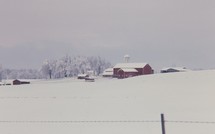 red barn in snow 