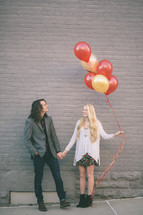 couple and balloons