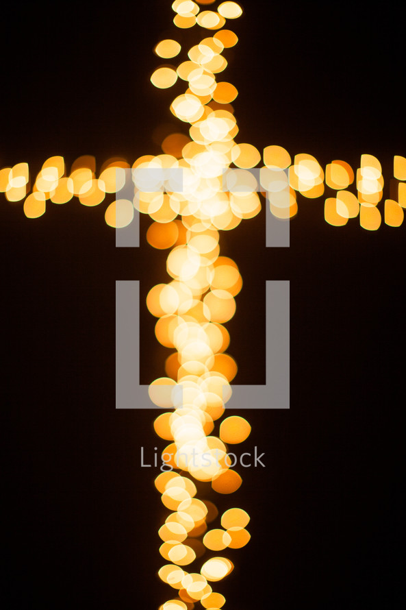bokeh Christmas lights in the shape of a cross 