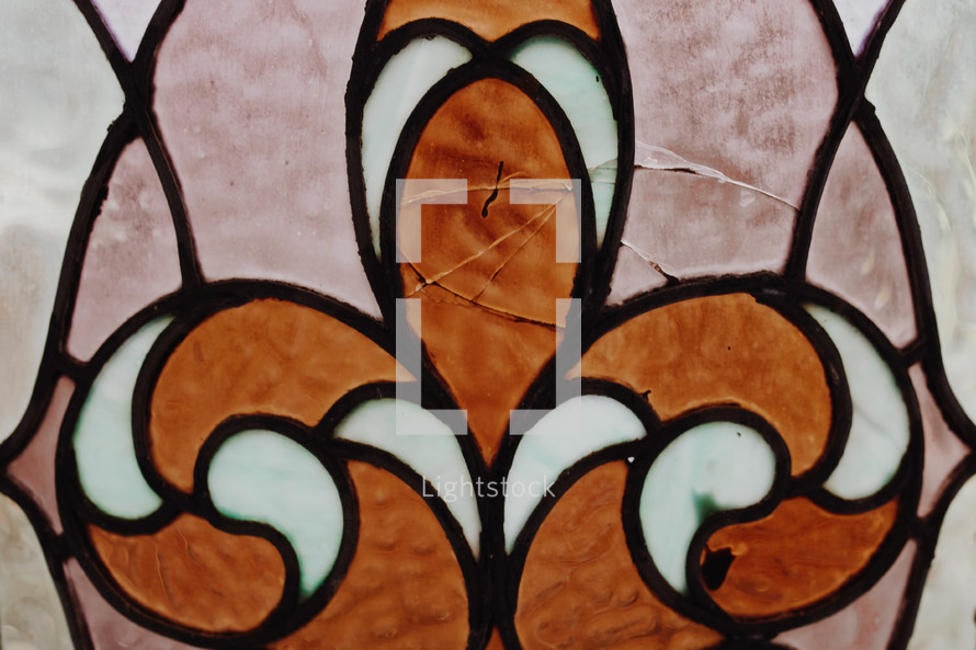 orange and white stained glass window 