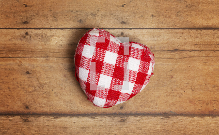 Red and White Plaid Love Heart on a wood Background