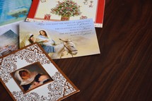 Christmas cards on a wood table 