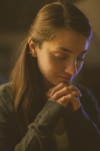 A woman in prayer 