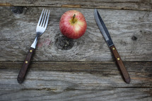fork and knife and apple 