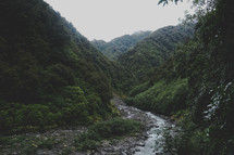 a stream through mountains 