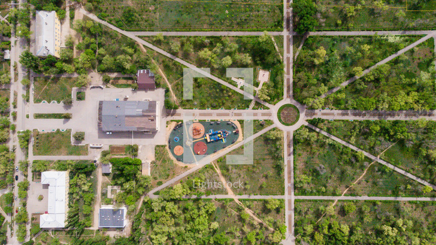 aerial view over a school and playground 