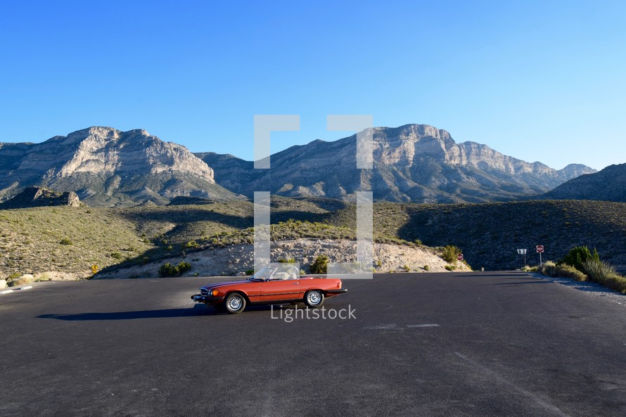 an old Mercedes parked on the scenic loop of Red Rock Canyon 
