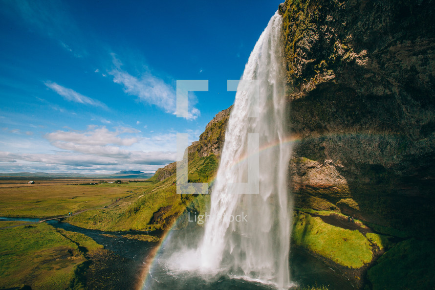 A waterfall and rainbow 