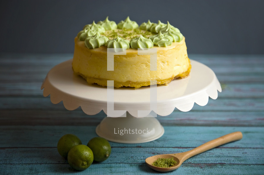key lime cake on a cake stand 