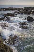 sea rocks and splashing water 