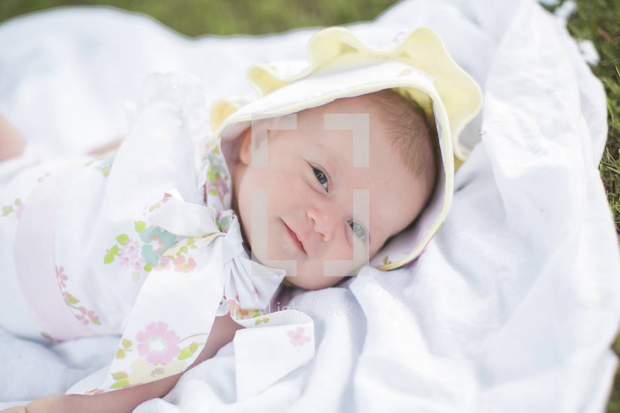 baby girl in a bonnet 