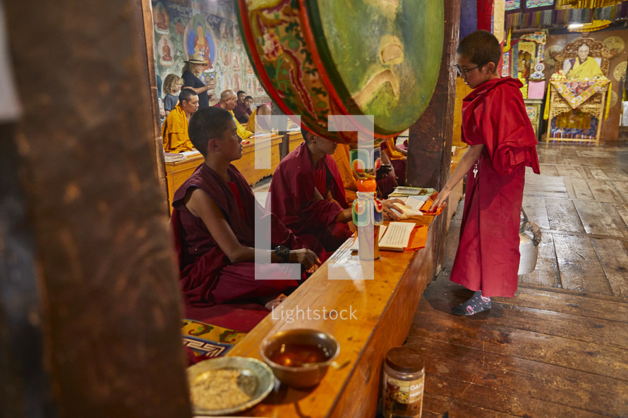 Buddhist monks praying 