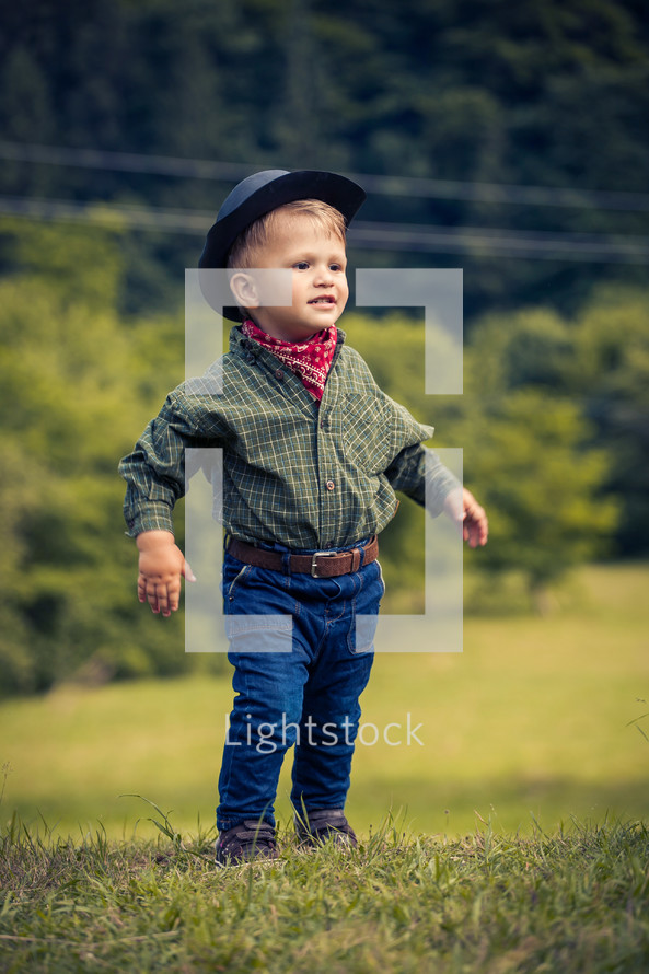Little Cute Boy in Western Costume