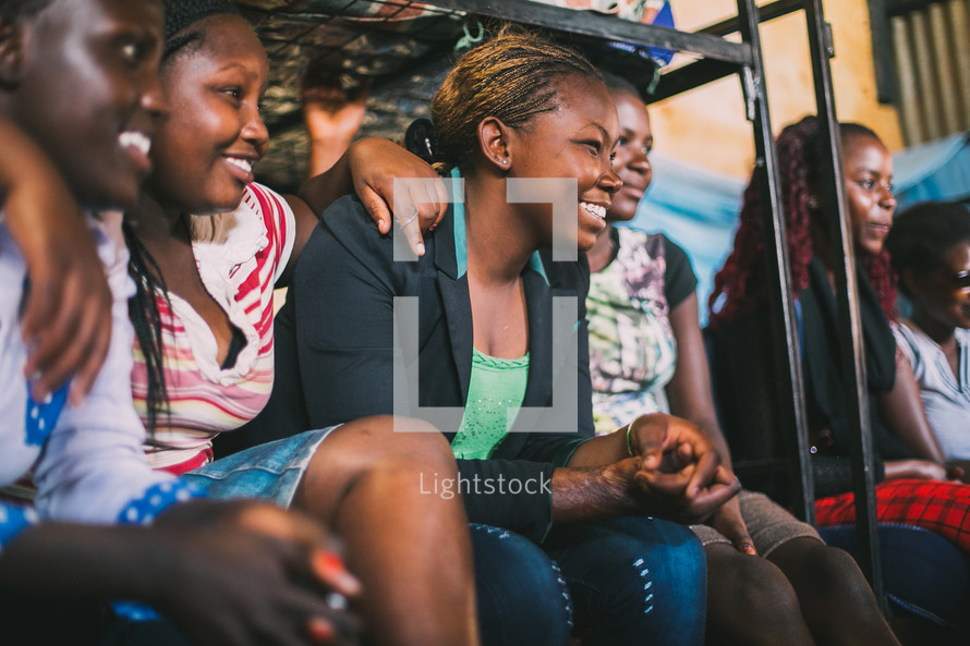 smiling faces of young women in Kenya 