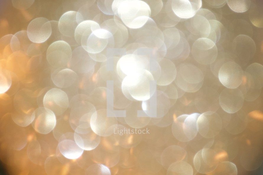 gold bokeh lights background for New Year's Eve